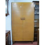 Russell of Broadway Oak and Burr Wood Wardrobe, circa mid XX Century, having fitted shelves to