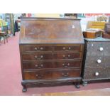 A 1920's Mahogany Bureau, with low detachable top, fall front concealing pigeon hole interior over