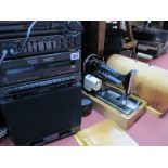Singer Sewing Machine, in domed case; Goodmans XB11M Dual Mic Karaoke, with microphones.