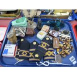 Naval Jacket Decorations, coins, pen knives, ebony bust, glass fish, beads, etc: - One Tray