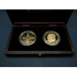 The First and Last Strike of The Guinea Commemorative Gold Crown Set, comprising of two 22ct Gold