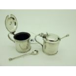 A Pair of Hallmarked Silver Lidded Mustards, HA, Sheffield 1913, of plain drum form, each with