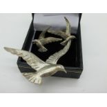 A Modern Bird In Flight Brooch, of textured design, stamped "Beau Sterling", together with