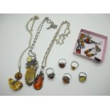 A Selection of Modern Amber Coloured Jewellery, including a large ornate teardrop pendant on