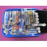 A Collection of Assorted Souvenir and Other Teaspoons, a set of six teaspoons with floral panel
