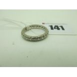 A Full Eternity Style Ring, with uniform inset highlights, stamped "18" (finger size P) (4.5