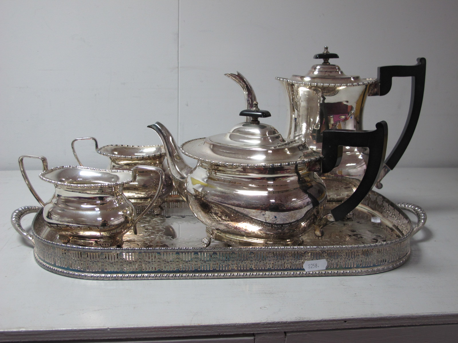 A Plated Four Piece Tea Set, each with bead and reel border, raised on reeded feet, on an oval