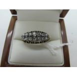 A Victorian Style Two Row Diamond Set Ring, graduated claw set throughout with old cut stones, (