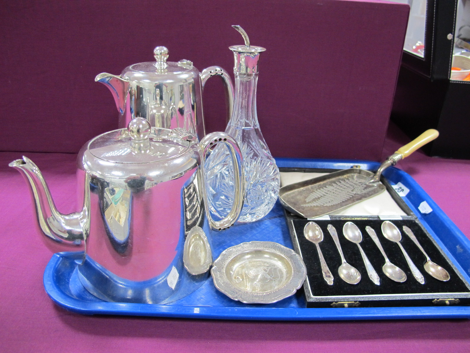 A Set of Six Hallmarked Silver Coffee Spoons, in a fitted case; a Peruvian pin dish, stamped "