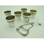 A Set of Six Gilt Lined Tots, each with band of stylised decoration, each indistinctly stamped "HB";