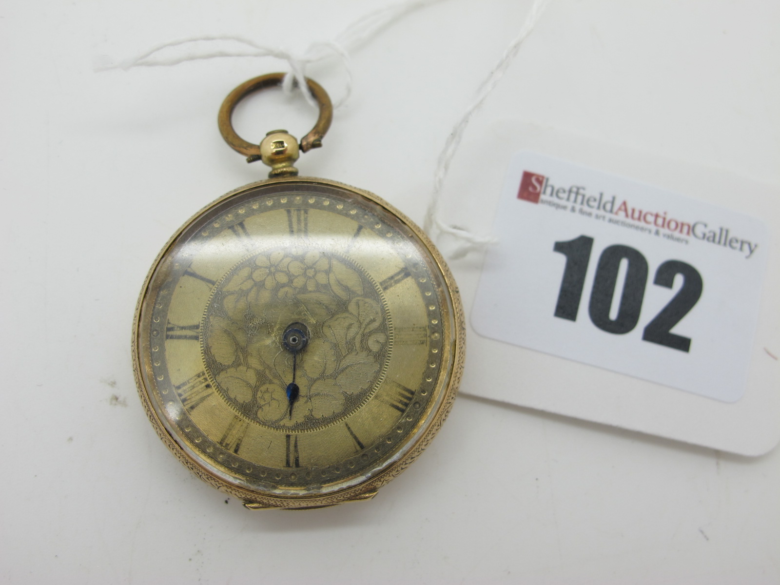 A Decorative Ladies Openface Fob Watch, to foliate engraved dial, with faded Roman numerals (missing