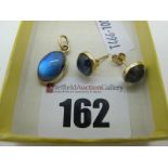 A 9ct Gold Oval Cabochon Set Pendant, together with matching 9ct gold earstuds.