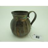 A Hallmarked Silver Jug, (marks rubbed) with reeded rim and handle, 8cm high.