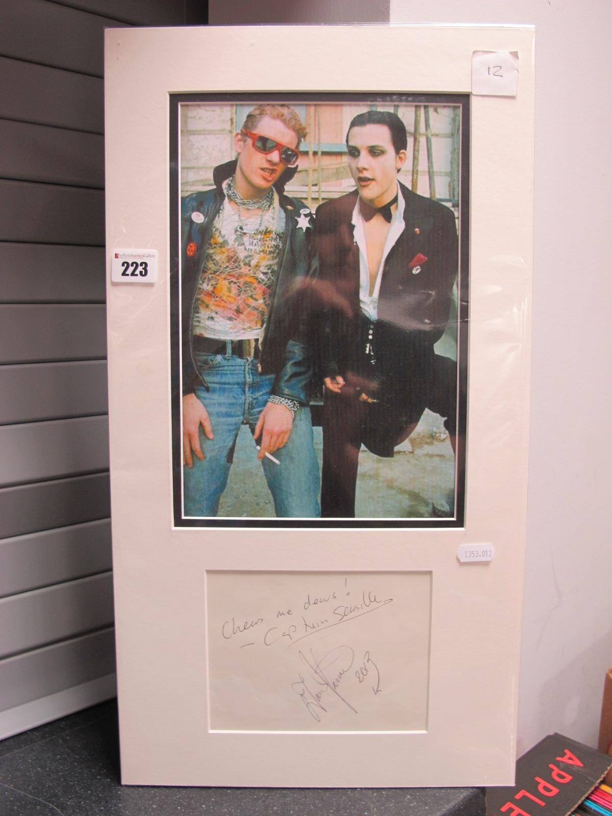 The Damned, Dave Vanian and Captain Sensible,signatures (unverified), framed.