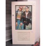 The Damned, Dave Vanian and Captain Sensible,signatures (unverified), framed.