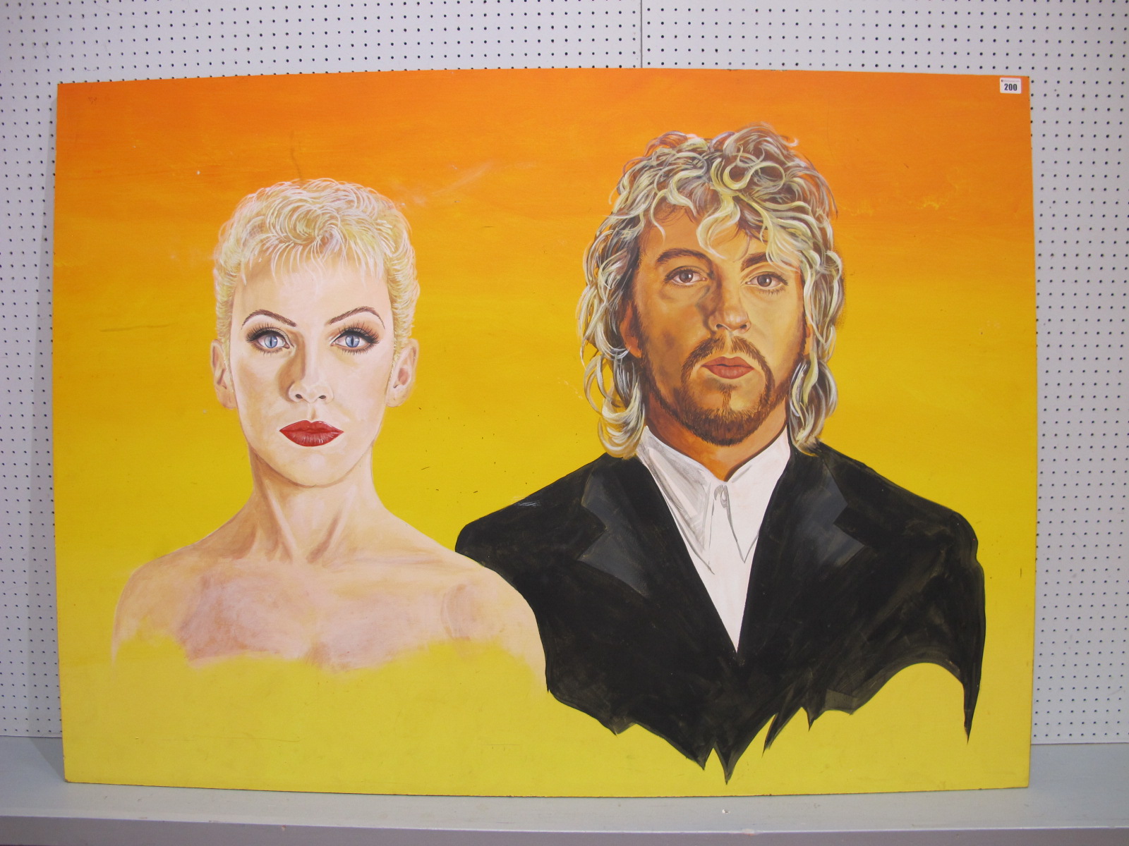 A Painting on Board Depicting Annie Lennox and Dave Stewart of The 1980's band The Eurythmics,