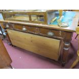 A Late XIX Century Oak and Pine Flat Top Desk, with green leatherette inset, cup handles to three