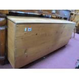 XIX Century Pine Blanket Chest, on paw feet, having iron castors, 123cm wide.