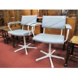 A Pair of Pale Blue Speckled Office Swivel Armchairs, each on white five star base.