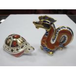 Royal Crown Derby Paperweights, Dragon and Tortoise, first quality, gilt stoppers. (2)