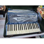 Italian Blue Marbelette Accordion, in carry case.