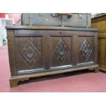 XVIII Century Oak Coffer, with carved three panel fascia, inner candle box, on later base, 106cm