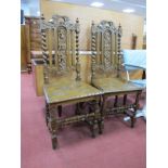 A Pair of Oak Hall Chairs, circa 1900, each with barley twist supports and stretchers, vine
