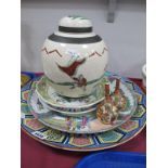 A Japanese Pottery Charger, decorated with birds and chrysanthemums with panel border, a famille