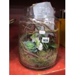 A Peony Artificial Flower Arrangement, in a glass jar, 31cm high.