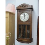 An Oak Cased Regulator Wall Clock, having Westminster chime movement.