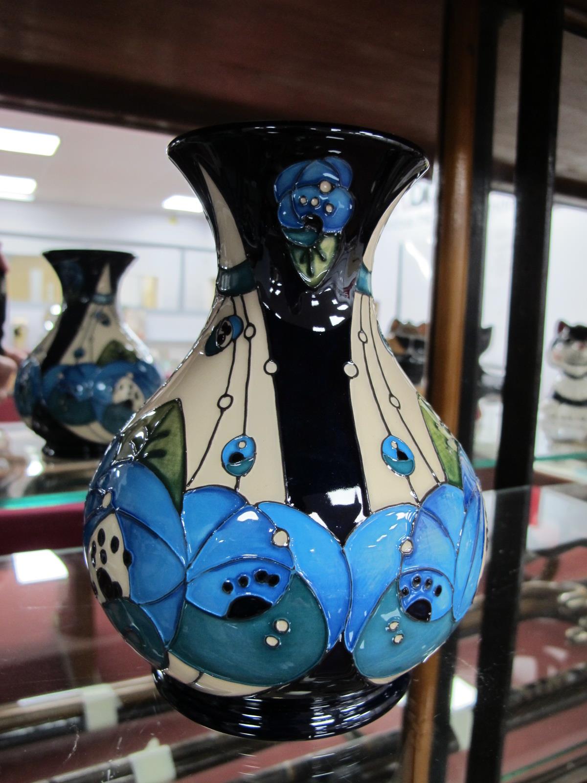 A Moorcroft Pottery Vase, painted in the 'Rennie Rose Blue' design, by Rachel Bishop, shape M1/6,