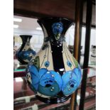 A Moorcroft Pottery Vase, painted in the 'Rennie Rose Blue' design, by Rachel Bishop, shape M1/6,