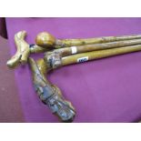 XIX Century Walking Stick, with carved dog's head; together with three other walking sticks, on