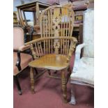 A XIX Century Ash and Elm Windsor Chair, having pierced central splat, dish seat and 'H' stretcher.