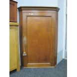 XIX Century and Later Oak Corner Cupboard, with panelled door, two internal shelves, 105cm high.