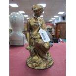 A XIX Century Gilded Bronze Figure, of a seated maiden 19.5cm high.