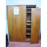 A G Plan Teak Wardrobe, circa 1970's with lipped handles to doors, approximately 124 cm wide.