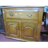 An Oak Cabinet with Lift Up Top, fall front and twin cupboard doors, 85.5 cm wide.