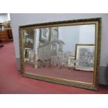 A Gilt Framed Rectangular Wall Mirror, bevelled, with Gipsy Caravan to centre, 71 x 1021.5 cm.