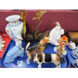 A Royal Doulton Figurine, 'Carol' Nao Figures, two pottery dogs, Royal Europe vase, two glass swans,