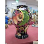 A Moorcroft Pottery Vase, painted in the 'Queens Choice' design, by Emma Bossons, shape 65/9, 24cm