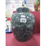 Poole Pottery Ginger Jar and Cover, of ovoid form, having all-over black speckled decoration, 24cm