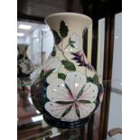 A Moorcroft Pottery Vase, painted in the 'Bramble Revisited' design by Alica Amison, shape M1/6,