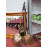 Two XIX Century Copper Bed Warming Pans, each with long turned wood handle. (2)