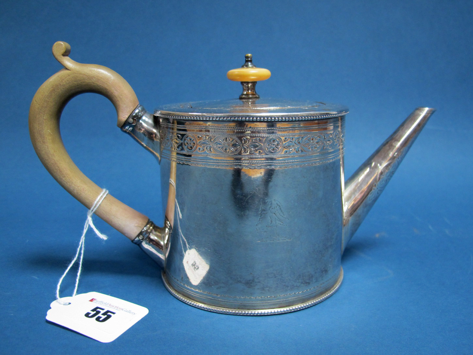 A Hallmarked Silver Teapot, RH, London 1788, of cylindrical form, with bright cut engraved