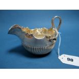 A Decorative Hallmarked Silver Jug, James Dixon & Son, Sheffield 1894, of semi reeded form with wavy