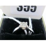 A Platinum Single Stone Diamond Ring, the (4.5mm) brilliant cut stone four claw set between plain