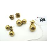 A Pair of 9ct Gold Ball Drop Earrings, together with a pair of large plain ball stud earrings; and a