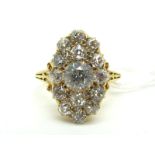A Large Late Victorian 18ct Gold Diamond Set Cluster Ring, set throughout with graduated old cut