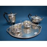 A Hallmarked Silver Four Piece Tea Set, Walker & Hall, Sheffield 1939, each of circular form with